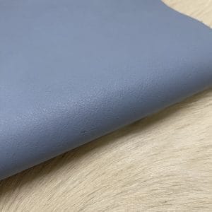 The Milano Cow Leather Collection is made of full-grain European leather produced from whole hides. This gives the leather a soft and luxurious finish on the surface, resulting in a subtle yet rich appearance. The collection is available in 48 complementary colors and is lightly pigmented and flexible, making it an excellent option for cutting. The Milano Collection is unbuffed and chrome-tanned, giving these leathers a smooth and elegant look.