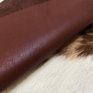 The Milano Cow Leather Collection is made of full-grain European leather produced from whole hides. This gives the leather a soft and luxurious finish on the surface, resulting in a subtle yet rich appearance. The collection is available in 48 complementary colors and is lightly pigmented and flexible, making it an excellent option for cutting. The Milano Collection is unbuffed and chrome-tanned, giving these leathers a smooth and elegant look.