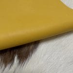 Solar Power Milano Cow Leather 3 oz-Avetco | Avetco Leather Hides and Eva Foam The Milano Cow Leather Collection is made of full-grain European leather produced from whole hides. This gives the leather a soft and luxurious finish on the surface, resulting in a subtle yet rich appearance. The collection is available in 48 complementary colors and is lightly pigmented and flexible, making it an excellent option for cutting. The Milano Collection is unbuffed and chrome-tanned, giving these leathers a smooth and elegant look.