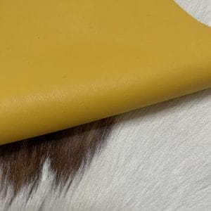 The Milano Cow Leather Collection is made of full-grain European leather produced from whole hides. This gives the leather a soft and luxurious finish on the surface, resulting in a subtle yet rich appearance. The collection is available in 48 complementary colors and is lightly pigmented and flexible, making it an excellent option for cutting. The Milano Collection is unbuffed and chrome-tanned, giving these leathers a smooth and elegant look.