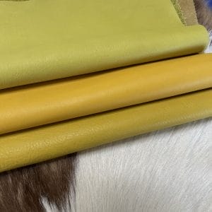 The Milano Cow Leather Collection is made of full-grain European leather produced from whole hides. This gives the leather a soft and luxurious finish on the surface, resulting in a subtle yet rich appearance. The collection is available in 48 complementary colors and is lightly pigmented and flexible, making it an excellent option for cutting. The Milano Collection is unbuffed and chrome-tanned, giving these leathers a smooth and elegant look.