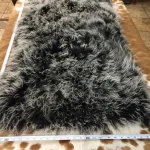 Our Mongolian Tibetan lamb fur plates, handpicked by expert craftsmen, offer superior quality. Each skin is made of the finest silky, long, and ultra-soft wool, ensuring it meets your standards. These plates are perfect for adding a touch of luxury to your home decor. You can use them to upholster furniture such as sofas, chairs, ottomans, benches, etc. They are also widely used in the fashion industry to create scarves, boas, tote bags, garments, and accessories. These 2ft x 4ft plates made with 4-5 inch long curly soft wool offer both style and comfort, making them an excellent choice for home decor or fashion.