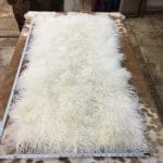 Our Mongolian Tibetan lamb fur plates, handpicked by expert craftsmen, offer superior quality. Each skin is made of the finest silky, long, and ultra-soft wool, ensuring it meets your standards. These plates are perfect for adding a touch of luxury to your home decor. You can use them to upholster furniture such as sofas, chairs, ottomans, benches, etc. They are also widely used in the fashion industry to create scarves, boas, tote bags, garments, and accessories. These 2ft x 4ft plates made with 4-5 inch long curly soft wool offer both style and comfort, making them an excellent choice for home decor or fashion.