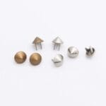 NH52 Cone Nailheads in Antique Brass and Nickel finishes – side-by-side comparison.-Avetco
