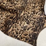 This beige cowhide with panther print adds a fierce, fashion-forward edge to any design. With bold black markings over soft beige tones, it's ideal for handbags, shoes, garments, furniture, pillows, and interior décor. Printed on premium hair-on cowhide and chrome tanned for durability and softness. Each hide is unique, perfect for custom statement pieces.