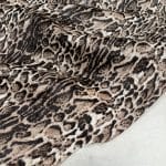 This beige cowhide with panther print adds a fierce, fashion-forward edge to any design. With bold black markings over soft beige tones, it's ideal for handbags, shoes, garments, furniture, pillows, and interior décor. Printed on premium hair-on cowhide and chrome tanned for durability and softness. Each hide is unique, perfect for custom statement pieces.