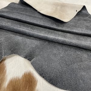 Indulge in luxury with our Lambskin Crackle Collection. Made of premium lambskin leather, each piece has a captivating crackle effect created by delicate waxing. With a matte finish and vibrant colors, the collection offers versatile possibilities. Elevate your wardrobe with statement apparel, chic handbags, sophisticated shoes or artisanal leather crafting. Experience timeless elegance and impeccable quality with our Lambskin Crackle Collection.