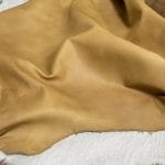 SL-201SPY Goatskin | Avetco Leather Hides and Eva Foam The Goatskin leather comes in a smooth finish that is very eye-catching, especially with the must-have authentic colors. The texture of the leather is silky smooth. This durable leather ranges from dark neutral colors to bright lively colors, which can be used to create many different looks.