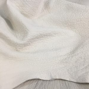 Bubble-shrunken Lambskin is a unique type of soft and cushiony lambskin with a shrunken bubble grain texture that gives it an intriguing and dynamic appearance. Each piece is one-of-a-kind due to the variation in the shrunken effect from one skin to another. The leather is semi-aniline dyed, making it rich and luxurious. It is also durable and flexible, with a thickness of 1.2-1.4 mm. Additionally, it is free from harmful chemicals, making it safe for use and environmentally friendly. If you're looking for high-quality and sustainable leather for apparel, accessories, handbags, or small leather goods, the Bubble Sheep collection is an excellent choice.