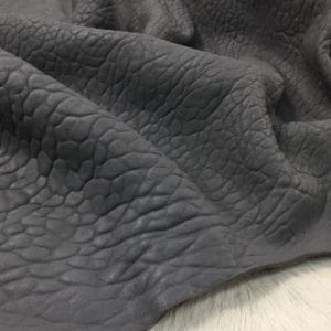 Bubble-shrunken Lambskin is a unique type of soft and cushiony lambskin with a shrunken bubble grain texture that gives it an intriguing and dynamic appearance. Each piece is one-of-a-kind due to the variation in the shrunken effect from one skin to another. The leather is semi-aniline dyed, making it rich and luxurious. It is also durable and flexible, with a thickness of 1.2-1.4 mm. Additionally, it is free from harmful chemicals, making it safe for use and environmentally friendly. If you're looking for high-quality and sustainable leather for apparel, accessories, handbags, or small leather goods, the Bubble Sheep collection is an excellent choice.