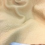 Tan Lambskin Avetcoinc@ | Avetco Leather Hides and Eva Foam Bubble-shrunken Lambskin is a unique type of soft and cushiony lambskin with a shrunken bubble grain texture that gives it an intriguing and dynamic appearance. Each piece is one-of-a-kind due to the variation in the shrunken effect from one skin to another. The leather is semi-aniline dyed, making it rich and luxurious. It is also durable and flexible, with a thickness of 1.2-1.4 mm. Additionally, it is free from harmful chemicals, making it safe for use and environmentally friendly. If you're looking for high-quality and sustainable leather for apparel, accessories, handbags, or small leather goods, the Bubble Sheep collection is an excellent choice.