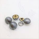These rivets are an excellent choice for various applications, such as accessories, decorations, handbags, garments, leathercraft, and more. They add elegance and style to any project. However, it is essential to note that professional setting tools are required for installing these rivets. The rivets are designed to be easy to install and suitable for beginners and professionals. These rivets come in three plating options: brushed antique nickel, antique brass, and antique copper. They are made of high-quality alloy material, which is durable and long-lasting. They are also nickel-free and lead-free, making them safe for various applications. The available size for these rivets is 28.5mm (1.12") in diameter, with a post length of 7.5mm (0.30") and a cap size of 17.5mm (0.69") flat round. These dimensions make the rivets suitable for a variety of applications. These rivets are made in Hong Kong, ensuring they meet all relevant standards and are of the highest quality.