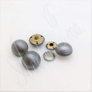 These rivets are an excellent choice for various applications, such as accessories, decorations, handbags, garments, leathercraft, and more. They add elegance and style to any project. However, it is essential to note that professional setting tools are required for installing these rivets. The rivets are designed to be easy to install and suitable for beginners and professionals. These rivets come in three plating options: brushed antique nickel, antique brass, and antique copper. They are made of high-quality alloy material, which is durable and long-lasting. They are also nickel-free and lead-free, making them safe for various applications. The available size for these rivets is 28.5mm (1.12") in diameter, with a post length of 7.5mm (0.30") and a cap size of 17.5mm (0.69") flat round. These dimensions make the rivets suitable for a variety of applications. These rivets are made in Hong Kong, ensuring they meet all relevant standards and are of the highest quality.