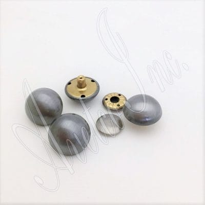 These rivets are an excellent choice for various applications, such as accessories, decorations, handbags, garments, leathercraft, and more. They add elegance and style to any project. However, it is essential to note that professional setting tools are required for installing these rivets. The rivets are designed to be easy to install and suitable for beginners and professionals. These rivets come in three plating options: brushed antique nickel, antique brass, and antique copper. They are made of high-quality alloy material, which is durable and long-lasting. They are also nickel-free and lead-free, making them safe for various applications. The available size for these rivets is 28.5mm (1.12") in diameter, with a post length of 7.5mm (0.30") and a cap size of 17.5mm (0.69") flat round. These dimensions make the rivets suitable for a variety of applications. These rivets are made in Hong Kong, ensuring they meet all relevant standards and are of the highest quality.