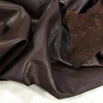 Buffalo Leather is a type of full-grain leather that has a rich and natural texture. The leather is soft to the touch and offers excellent comfort. It is also durable and has a consistent color, making it an exquisite option for upholstery, accessories, handbags, shoes, motorcycle apparel, and more. The unbuffed surface gives the material a matte appearance with a subtle shine, adding character to its otherwise subtle look. The Buffalo aniline collection is also skillfully prepared to provide excellent cutting yields.