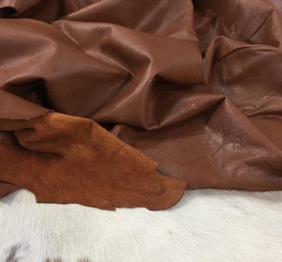 Buffalo Leather is a type of full-grain leather that has a rich and natural texture. The leather is soft to the touch and offers excellent comfort. It is also durable and has a consistent color, making it an exquisite option for upholstery, accessories, handbags, shoes, motorcycle apparel, and more. The unbuffed surface gives the material a matte appearance with a subtle shine, adding character to its otherwise subtle look. The Buffalo aniline collection is also skillfully prepared to provide excellent cutting yields.