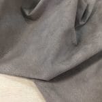 What is pig Leather Pig Leather collection - a range of leather products crafted from split suede material with a velvety texture. This leather is not only incredibly soft but also comes in a stunning array of colors that are sure to please any fashion enthusiast. The collection's versatile hues are perfect for creating a variety of atmospheres, from a dark and mystical ambiance to a pastel and dreamy feel. Whether you're looking to line a garment, create a handbag, or design footwear, this leather is sure to impress. With a whole hide ranging from 7-9 square feet and a thickness of 0.6-0.8 mm, you'll get to experience the beauty of a high-quality material that is both durable and stylish.