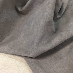 What is pig Leather Pig Leather collection - a range of leather products crafted from split suede material with a velvety texture. This leather is not only incredibly soft but also comes in a stunning array of colors that are sure to please any fashion enthusiast. The collection's versatile hues are perfect for creating a variety of atmospheres, from a dark and mystical ambiance to a pastel and dreamy feel. Whether you're looking to line a garment, create a handbag, or design footwear, this leather is sure to impress. With a whole hide ranging from 7-9 square feet and a thickness of 0.6-0.8 mm, you'll get to experience the beauty of a high-quality material that is both durable and stylish.
