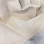 What is pig Leather Pig Leather collection - a range of leather products crafted from split suede material with a velvety texture. This leather is not only incredibly soft but also comes in a stunning array of colors that are sure to please any fashion enthusiast. The collection's versatile hues are perfect for creating a variety of atmospheres, from a dark and mystical ambiance to a pastel and dreamy feel. Whether you're looking to line a garment, create a handbag, or design footwear, this leather is sure to impress. With a whole hide ranging from 7-9 square feet and a thickness of 0.6-0.8 mm, you'll get to experience the beauty of a high-quality material that is both durable and stylish.