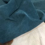What is pig Leather Pig Leather collection - a range of leather products crafted from split suede material with a velvety texture. This leather is not only incredibly soft but also comes in a stunning array of colors that are sure to please any fashion enthusiast. The collection's versatile hues are perfect for creating a variety of atmospheres, from a dark and mystical ambiance to a pastel and dreamy feel. Whether you're looking to line a garment, create a handbag, or design footwear, this leather is sure to impress. With a whole hide ranging from 7-9 square feet and a thickness of 0.6-0.8 mm, you'll get to experience the beauty of a high-quality material that is both durable and stylish.