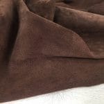 What is pig Leather Pig Leather collection - a range of leather products crafted from split suede material with a velvety texture. This leather is not only incredibly soft but also comes in a stunning array of colors that are sure to please any fashion enthusiast. The collection's versatile hues are perfect for creating a variety of atmospheres, from a dark and mystical ambiance to a pastel and dreamy feel. Whether you're looking to line a garment, create a handbag, or design footwear, this leather is sure to impress. With a whole hide ranging from 7-9 square feet and a thickness of 0.6-0.8 mm, you'll get to experience the beauty of a high-quality material that is both durable and stylish.