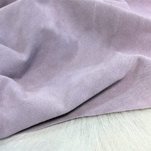 What is pig Leather Pig Leather collection - a range of leather products crafted from split suede material with a velvety texture. This leather is not only incredibly soft but also comes in a stunning array of colors that are sure to please any fashion enthusiast. The collection's versatile hues are perfect for creating a variety of atmospheres, from a dark and mystical ambiance to a pastel and dreamy feel. Whether you're looking to line a garment, create a handbag, or design footwear, this leather is sure to impress. With a whole hide ranging from 7-9 square feet and a thickness of 0.6-0.8 mm, you'll get to experience the beauty of a high-quality material that is both durable and stylish.