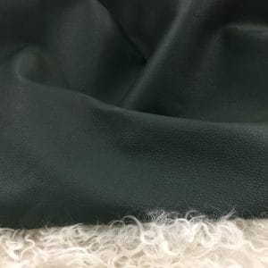 The Stretch Nappa Lambskin Collection! This European full-grain leather features integrated stretchable fibers for increased elasticity, making it perfect for garments, gloves, skirts, jackets, footwear, and accessories. Available in twelve vibrant colors, this durable and smooth leather undergoes a drum-dye process to enhance pigmentation. Originating from Turkey, it is 0.5 – 0.7 mm thick and made from lambskin (Nappa) with a base fabric of 97-98% cotton and 3-2% Lycra.