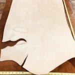 This premium 10/11 oz stamping leather is crafted from 100% natural veg-tanned cowhide using a meticulous drum process to ensure top-notch quality. All selections undergo the same rigorous treatment to guarantee exceptional rupture resistance, moisture protection, water penetration, and flexibility.