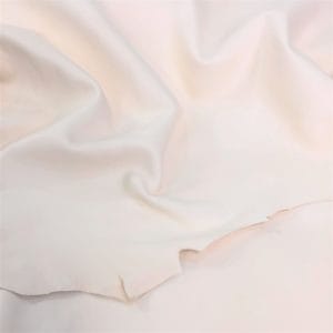 Natural Veg Tanned Lambskin Leather is perfect for various projects. It is 100% vegetable-tanned using a drum process, resulting in high-quality leather that is durable and flexible while being resistant to rupture, moisture, and water penetration.