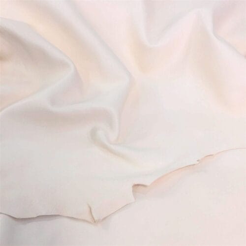 Natural Veg Tanned Lambskin Leather is perfect for various projects. It is 100% vegetable-tanned using a drum process, resulting in high-quality leather that is durable and flexible while being resistant to rupture, moisture, and water penetration.