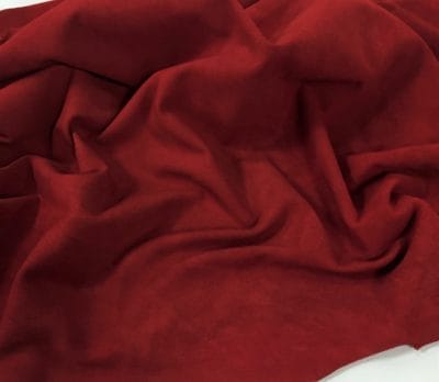 Goatskin Garment Suede Leather 5-7 square feet hide Leather 1.5oz thick soft and easy to use Suitable for shoes footwear handbags garments shirts jackets vests What is Goat Suede? Goat suede undergoes an extra finishing process that creates a velvety texture. This process involves buffing the flesh side of the hide, resulting in a soft and textured nap that feels wonderful to the touch.