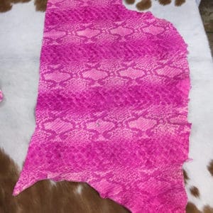 Python Embossed Cow leather, made from cowhide, is an excellent choice for DIY leather projects, such as arts and crafts, jewelry, leather earrings, bracelets, wallets, small leather goods, and patchwork. The key to success is having an inspirational idea. This leather is chrome-tanned and has a soft to medium temper. It comes in an average hide size of 3-5 sq. ft. and has a thickness of 3 oz (1.0-1.2 mm). Although it may have some holes or defects, it is free of PCP, Azo pigments, Chrome VI, Formaldehyde, and APEO, making it safe to use. To save on shipping costs, the leather is folded and inserted into a padded envelope. If you want to avoid creases due to folding, please contact us for special handling.