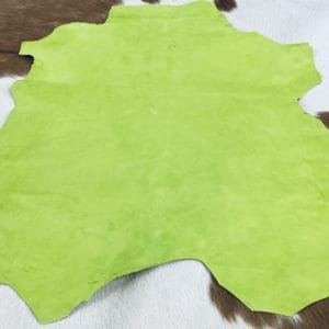 This Economy Goat Suede Leather is a soft and luxurious material that adds a chic touch to any style. It's perfect for creating accessories, handbags, shoes, belts, and apparel. The leather weighs 3oz and has a thickness of 1.0-1.2mm, with an average hide size of 2-3sq ft. The leather has a medium soft temper and was tanned using chrome. It may have some blemishes or holes, but it's still a high-quality manufacturing grade B leather. Originating from Italy, this suede leather is irresistible to the touch.