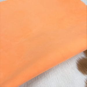 This Economy Goat Suede Leather is a soft and luxurious material that adds a chic touch to any style. It's perfect for creating accessories, handbags, shoes, belts, and apparel. The leather weighs 3oz and has a thickness of 1.0-1.2mm, with an average hide size of 2-3sq ft. The leather has a medium soft temper and was tanned using chrome. It may have some blemishes or holes, but it's still a high-quality manufacturing grade B leather. Originating from Italy, this suede leather is irresistible to the touch.