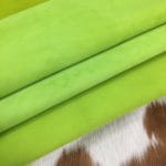 bright chatreuse (4) | Avetco Leather Hides and Eva Foam This Economy Goat Suede Leather is a soft and luxurious material that adds a chic touch to any style. It's perfect for creating accessories, handbags, shoes, belts, and apparel. The leather weighs 3oz and has a thickness of 1.0-1.2mm, with an average hide size of 2-3sq ft. The leather has a medium soft temper and was tanned using chrome. It may have some blemishes or holes, but it's still a high-quality manufacturing grade B leather. Originating from Italy, this suede leather is irresistible to the touch.