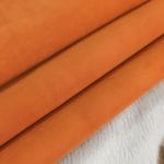This Economy Goat Suede Leather is a soft and luxurious material that adds a chic touch to any style. It's perfect for creating accessories, handbags, shoes, belts, and apparel. The leather weighs 3oz and has a thickness of 1.0-1.2mm, with an average hide size of 2-3sq ft. The leather has a medium soft temper and was tanned using chrome. It may have some blemishes or holes, but it's still a high-quality manufacturing grade B leather. Originating from Italy, this suede leather is irresistible to the touch.