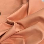 Lambskin Leather Grade C is a type of leather that might have some imperfections, but they do not affect its performance. Instead, these flaws give it a unique appearance. The leather's raw material is sourced from sheep or lamb, and it weighs 2 oz. with a thickness of 0.7-0.9 mm. Furthermore, the economy grade Lamb leather may have uneven shade tone, dark spots, stretch marks, scarring, scratches, or a few holes. However, these flaws do not affect its performance. Instead, they give it a unique appearance that sets it apart from other types of leather.