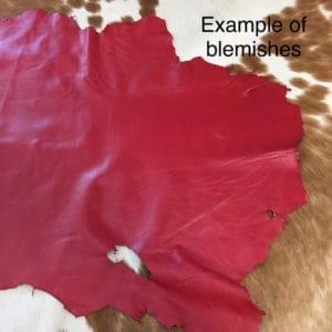 Lambskin Leather Grade C is a type of leather that might have some imperfections, but they do not affect its performance. Instead, these flaws give it a unique appearance. The leather's raw material is sourced from sheep or lamb, and it weighs 2 oz. with a thickness of 0.7-0.9 mm. Furthermore, the economy grade Lamb leather may have uneven shade tone, dark spots, stretch marks, scarring, scratches, or a few holes. However, these flaws do not affect its performance. Instead, they give it a unique appearance that sets it apart from other types of leather.