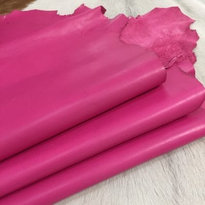 Economy Leather, Grade C, is a type of leather that might have some imperfections, but they do not affect its performance. Instead, these flaws give it a unique appearance. The leather's raw material is sourced from sheep or lamb, and it weighs 2 oz. with a thickness of 0.7-0.9 mm. The economy grade leather may have uneven shade tone, dark spots, stretch marks, scarring, scratches, or a few holes, but it is still suitable for various uses. The leather has a semi-gloss finish, and its soft-medium temper makes it pliable and easy to work with. An average hide size is 6-8 sq. ft., and it originates from Pakistan. You can use this type of leather for making accessories, arts and crafts, shoes, apparel, and more.