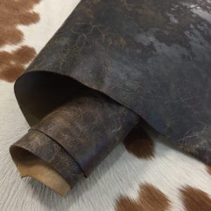 Distressed cowhide with a rugged, vintage look and waxy feel—perfect for bold footwear, bags, belts, and standout DIY leather projects.