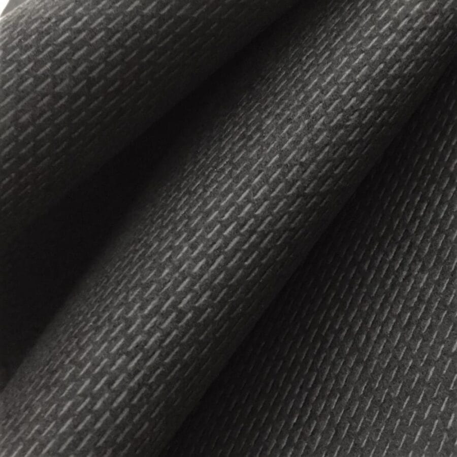 Oropal E162SP is a type of self-adhesive interfacing that provides stability and strength to fabrics of various weights, from lightweight to medium weight. This non-woven interfacing fabric is a crucial material in adding intricate details to any sewing project, such as interlining, shoes, handbags, garments, and leather. The interfacing fabric is made of high-quality polyester, which is a synthetic material known for its durability and strength. It is available in two classic colors, white and black, making it easy to match with any type of fabric. The fabric is 57 inches wide, with a tolerance of plus or minus 2 inches, and each roll contains 5 yards with a thickness of 0.5mm. The texture of the interfacing fabric is medium, which means it is not too rough or too smooth. This texture provides stability to fabrics without causing any discomfort or irritation. It is also flexible and easy to work with, making it ideal for a wide range of sewing projects.