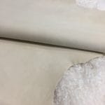 goat suede ANGORA CREAM (2) | Avetco Leather Hides and Eva Foam The Goatskin Suede Leather features a wonderful texture that is eye-catching and feels luxurious to the touch. Its versatility stems from a distinctive tanning method that involves gentle buffing, making it ideal for use in various items such as clothing, moccasins, lining, handbags, shoes, and accessories. Those who value timeless elegance and quality will undoubtedly find this leather worth the investment, as it guarantees utmost quality and worth through full hide pieces that typically range in size between 2-4 square feet and have a thickness of 3 oz (1.0-1.1mm). What is Goat Suede? Goat suede undergoes an extra finishing process that creates a velvety texture. This process involves buffing the flesh side of the hide, resulting in a soft and textured nap that feels wonderful to the touch.