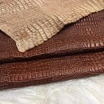 The crocodile-embossed cow full grain leather is a great choice for DIY leather projects such as arts and crafts, jewelry, leather earrings, leather bracelets, wallets, small leather goods, and patchwork. The inspirational idea will be the key. This leather is chrome-tanned and has a soft to medium temper. It has an average hide size of 4-9 sq. ft. and a thickness of 3 oz (1.0-1.2 mm). It may have some holes or defects, but it is free of PCP, Azo pigments, Chrome VI, Formaldehyde, and APEO. To save on shipping costs, the leather is folded and inserted into a padded envelope. If you want to avoid creases due to folding, please contact us for special handling.