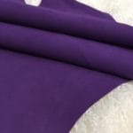 The Goatskin Suede Leather features a wonderful texture that is eye-catching and feels luxurious to the touch. Its versatility stems from a distinctive tanning method that involves gentle buffing, making it ideal for use in various items such as clothing, moccasins, lining, handbags, shoes, and accessories. Those who value timeless elegance and quality will undoubtedly find this leather worth the investment, as it guarantees utmost quality and worth through full hide pieces that typically range in size between 2-4 square feet and have a thickness of 3 oz (1.0-1.1mm). What is Goat Suede? Goat suede undergoes an extra finishing process that creates a velvety texture. This process involves buffing the flesh side of the hide, resulting in a soft and textured nap that feels wonderful to the touch.