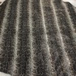 This Glazer Lambskin Article is a beautiful snakeskin printed hide with a combination of exotic colors and warm tones. The leather itself is slightly textured with a bit of a stretch making it useful for many different projects. This eye-catching leather has a unique, yet sophisticated look that possesses modern-day fashion.
