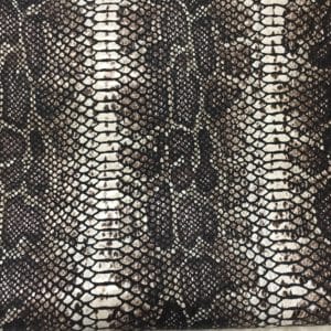 This Glazer Lambskin Article is a beautiful snakeskin printed hide with a combination of exotic colors and warm tones. The leather itself is slightly textured with a bit of a stretch making it useful for many different projects. This eye-catching leather has a unique, yet sophisticated look that possesses modern-day fashion.