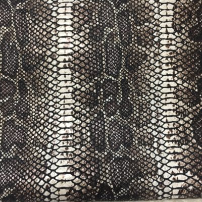 This Glazer Lambskin Article is a beautiful snakeskin printed hide with a combination of exotic colors and warm tones. The leather itself is slightly textured with a bit of a stretch making it useful for many different projects. This eye-catching leather has a unique, yet sophisticated look that possesses modern-day fashion.