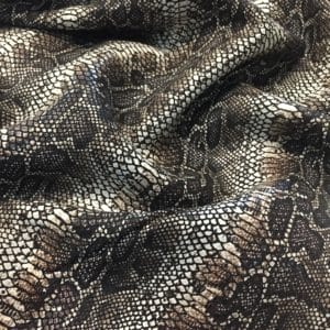 This Glazer Lambskin Article is a beautiful snakeskin printed hide with a combination of exotic colors and warm tones. The leather itself is slightly textured with a bit of a stretch making it useful for many different projects. This eye-catching leather has a unique, yet sophisticated look that possesses modern-day fashion.