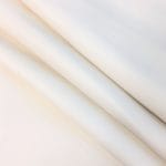 The Stretch Nappa Lambskin Collection! This European full-grain leather features integrated stretchable fibers for increased elasticity, making it perfect for garments, gloves, skirts, jackets, footwear, and accessories. Available in twelve vibrant colors, this durable and smooth leather undergoes a drum-dye process to enhance pigmentation. Originating from Turkey, it is 0.5 – 0.7 mm thick and made from lambskin (Nappa) with a base fabric of 97-98% cotton and 3-2% Lycra.