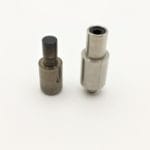 Top and bottom inserts of EL2 die setter – 9.4mm and 12.6mm sizes displayed for use with 8mm beveled grommets